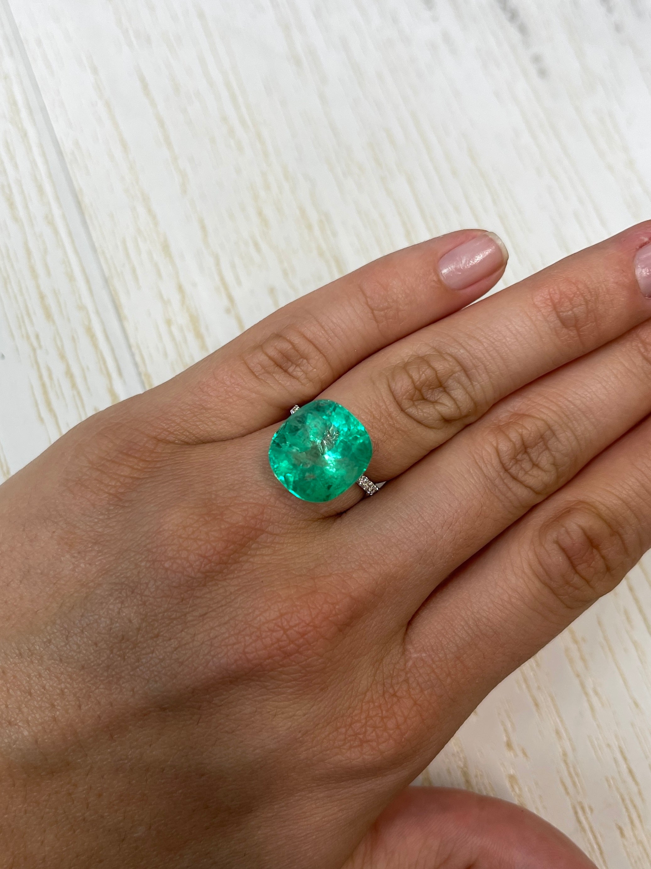 Large 13.63 carat medium green natural Colombian emerald in cushion cut, loose gemstone from JR Colombian Emeralds.