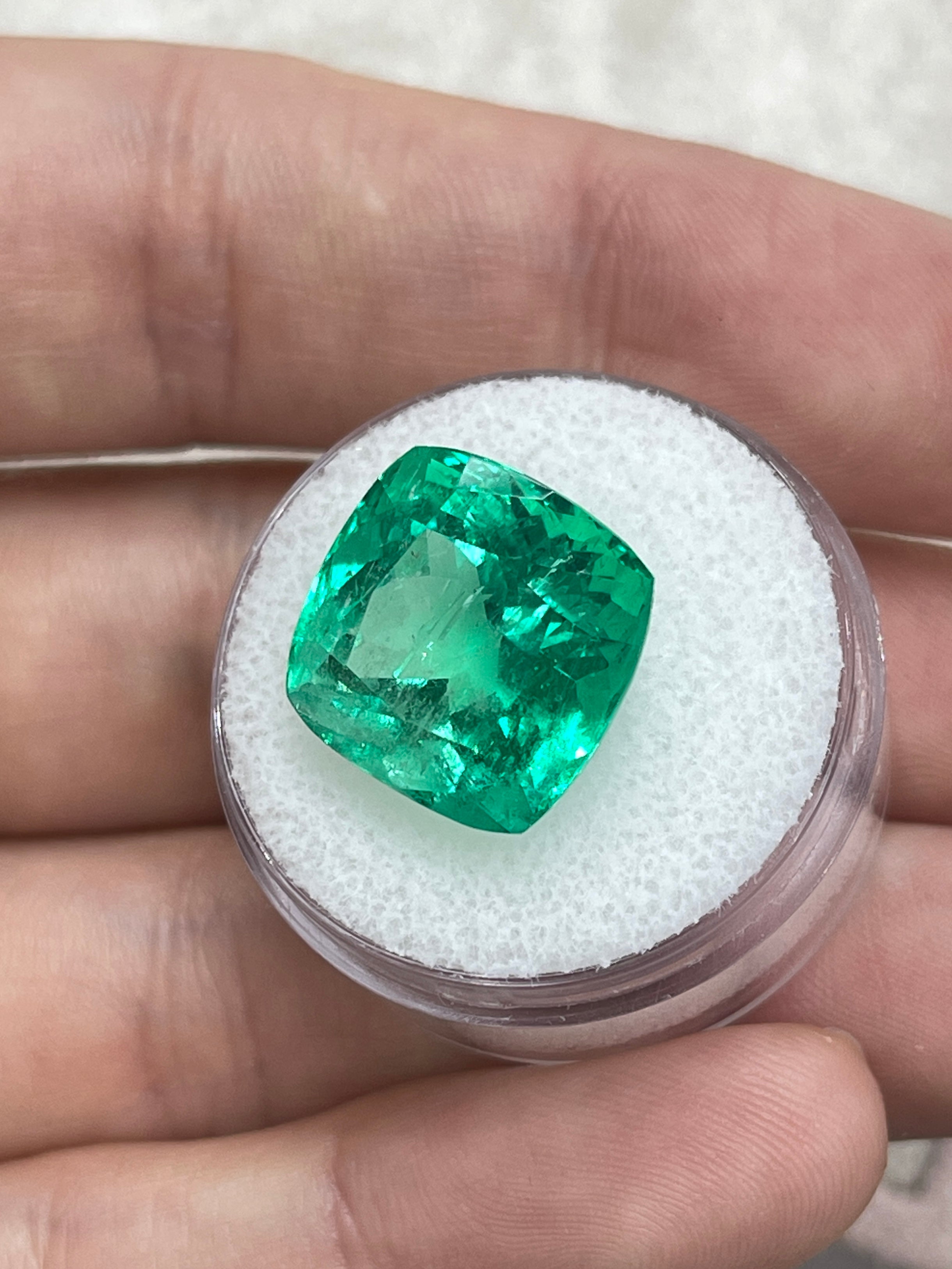 Large 13.88-carat bluish green cushion cut Colombian emerald, loose, ethically mined, from JR Colombian Emeralds.