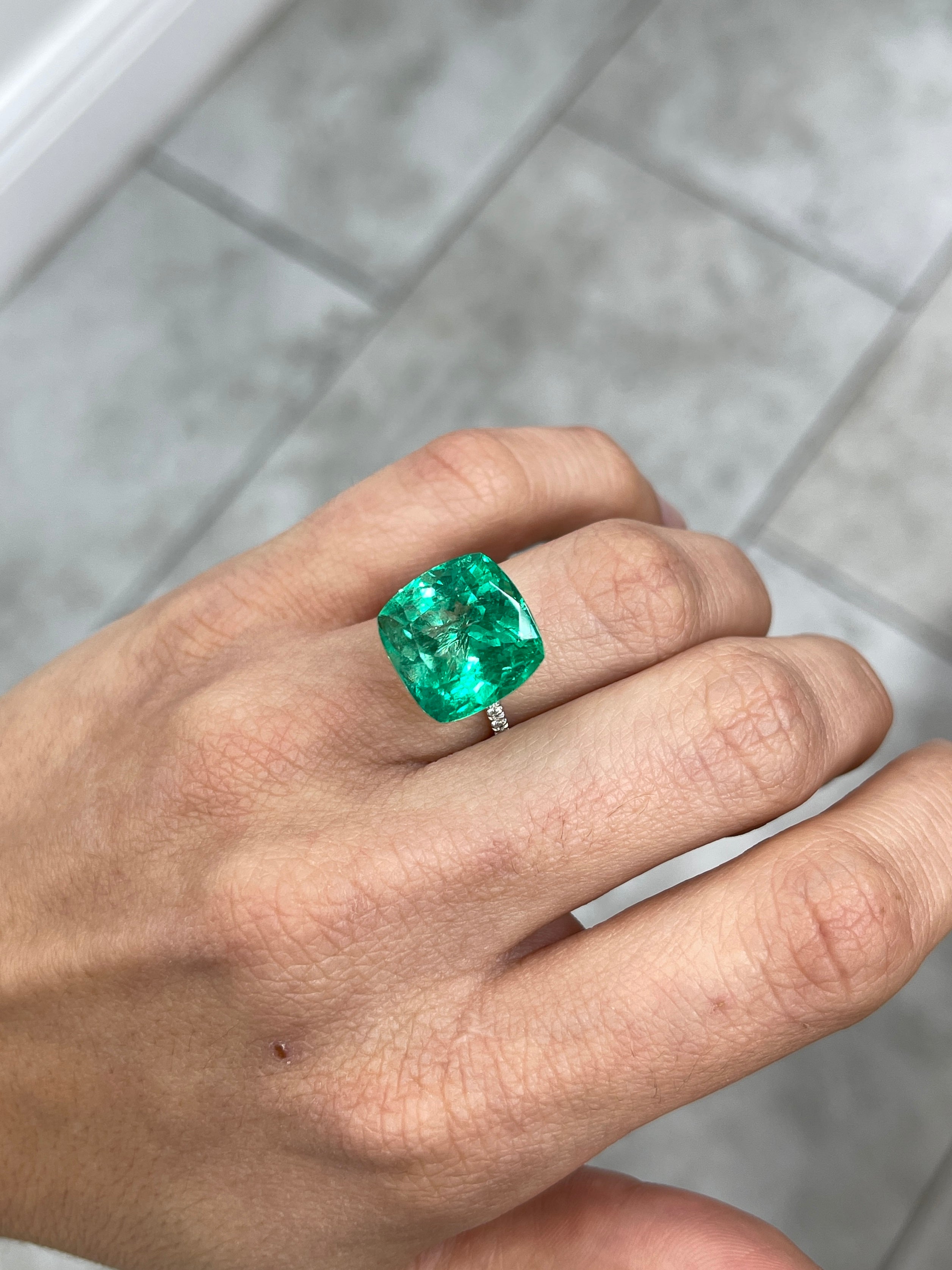 Large 13.88-carat bluish green cushion cut Colombian emerald loose gemstone by JR Colombian Emeralds, ethically mined.