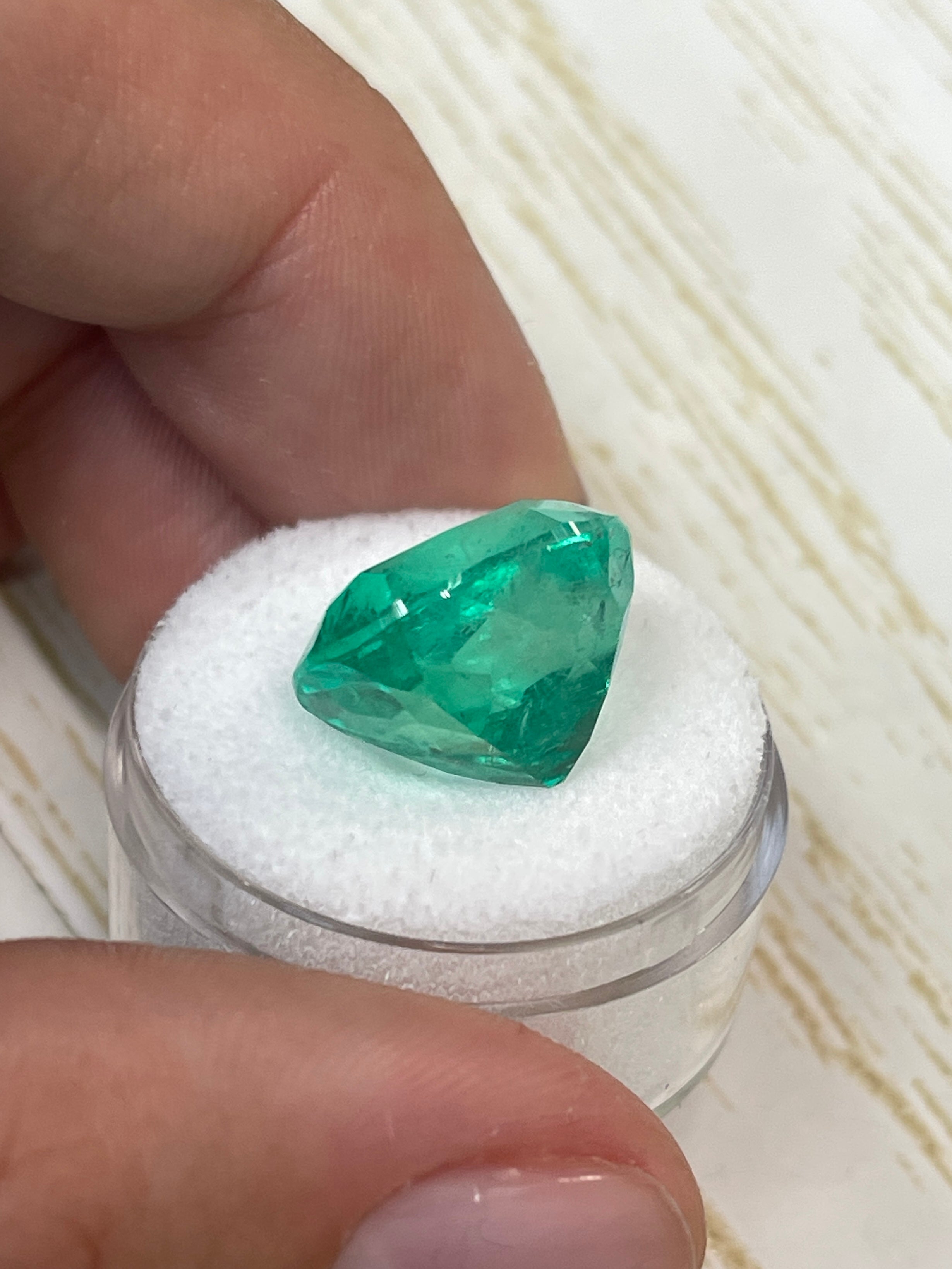 Large 14.44 carat bluish green natural Colombian emerald loose cushion cut gemstone from JR Colombian Emeralds.
