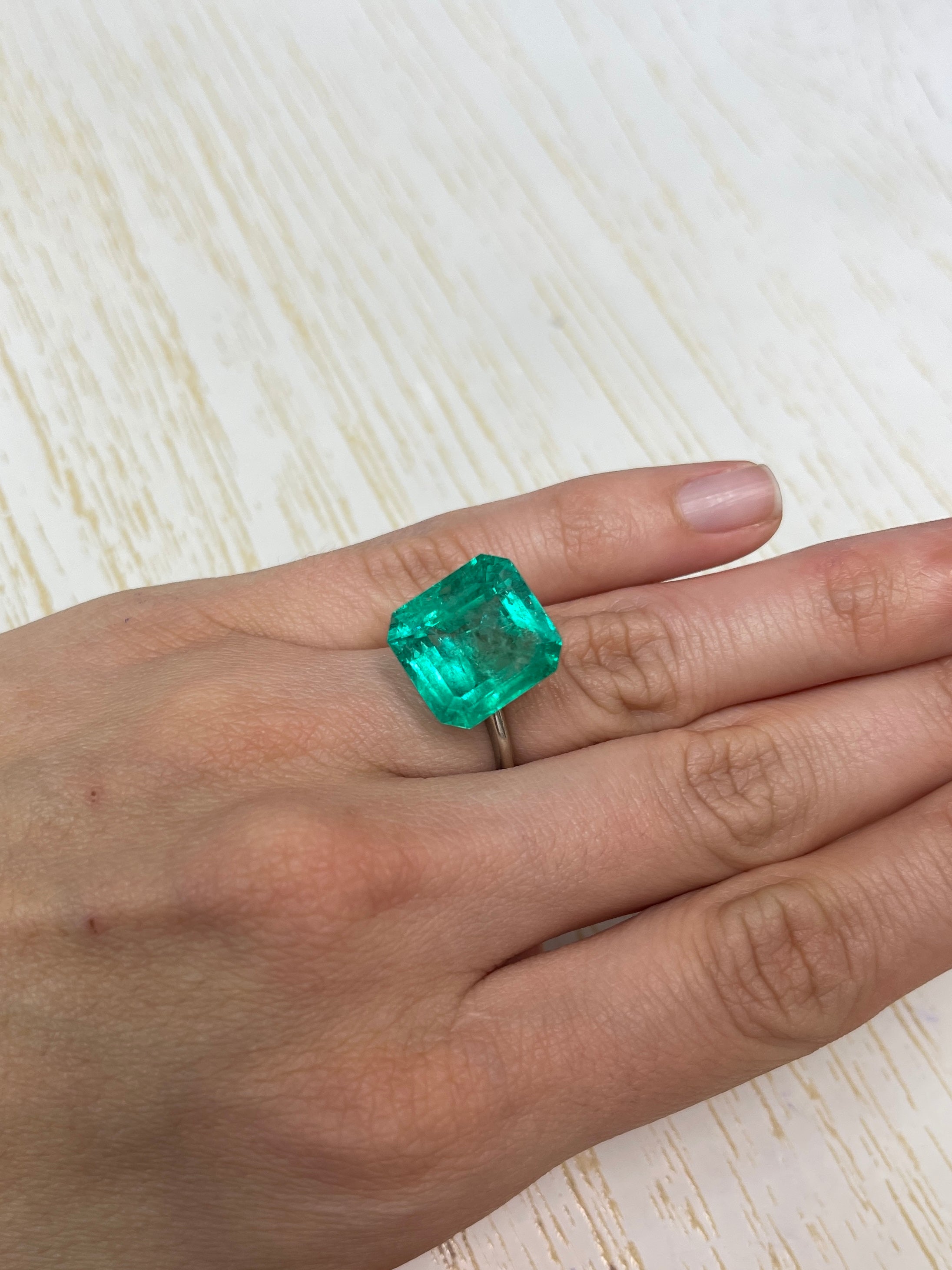 Large 15.28 carat Colombian emerald loose gemstone with GIA certificate, emerald cut, from JR Colombian Emeralds.