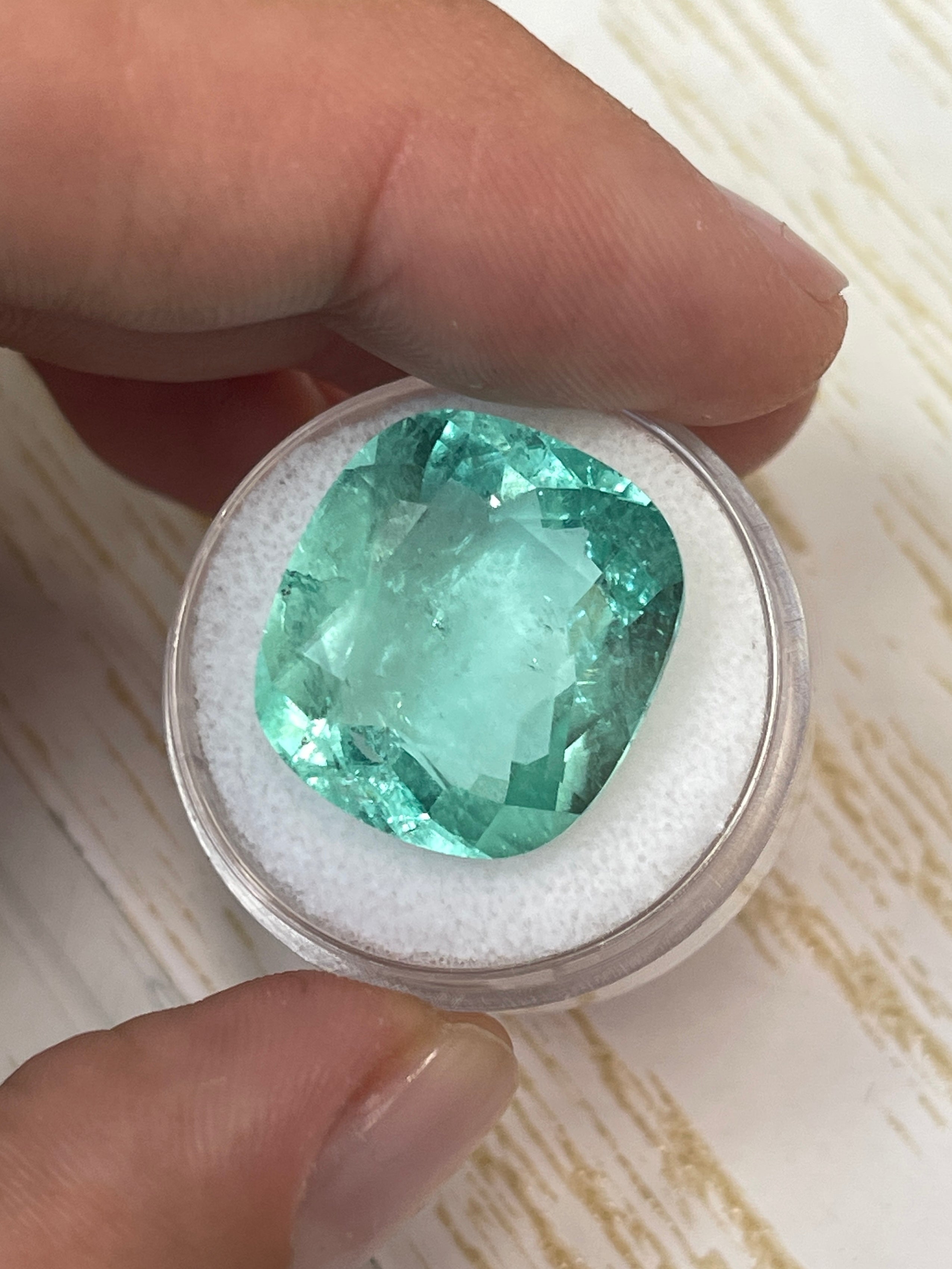 Large 19.41 carat natural Colombian emerald, cushion cut, pastel green, VS clarity, loose gemstone from JR Colombian Emeralds