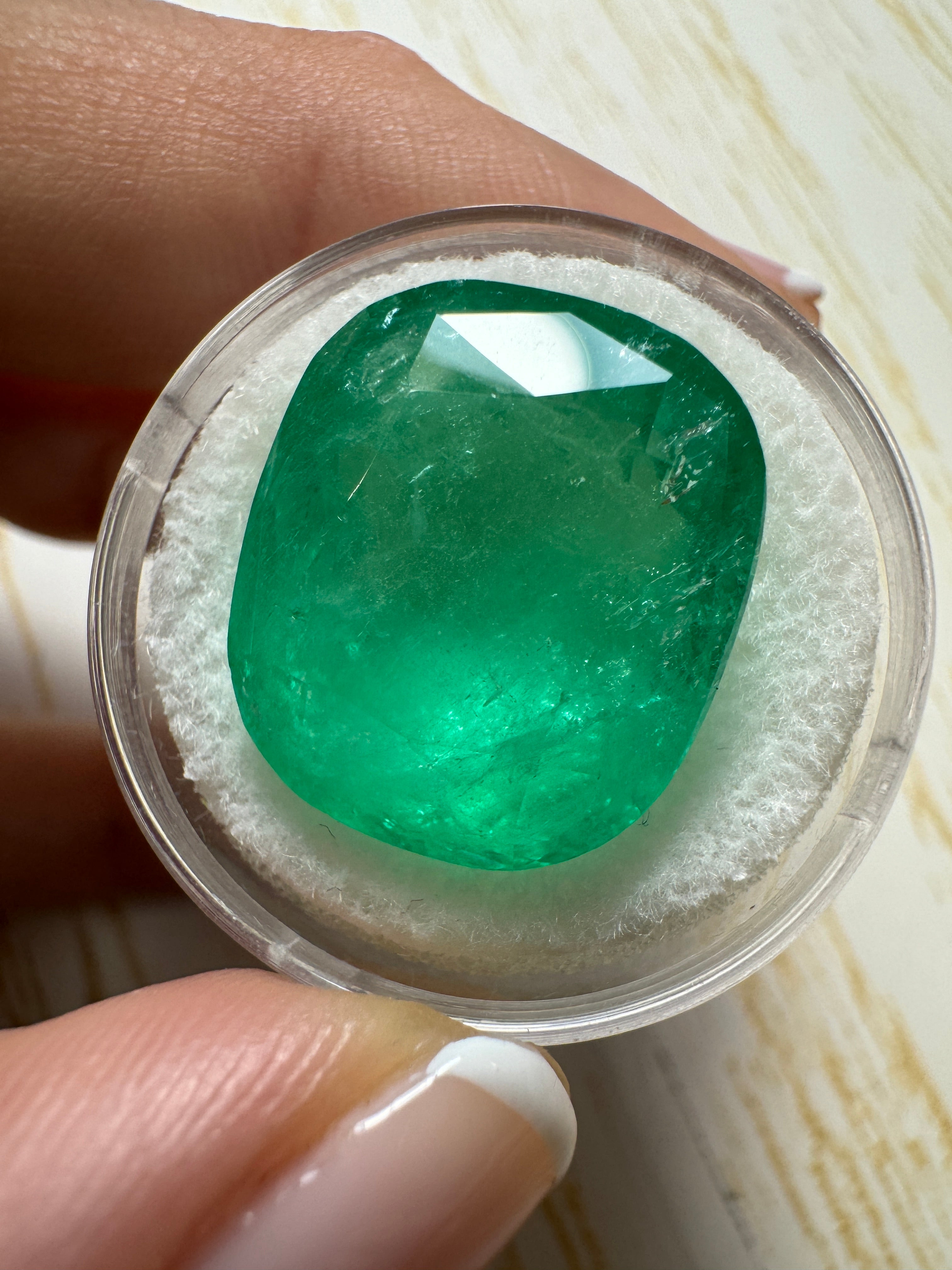 Large 22.61 carat spring green Colombian emerald loose cushion cut gemstone from JR Colombian Emeralds