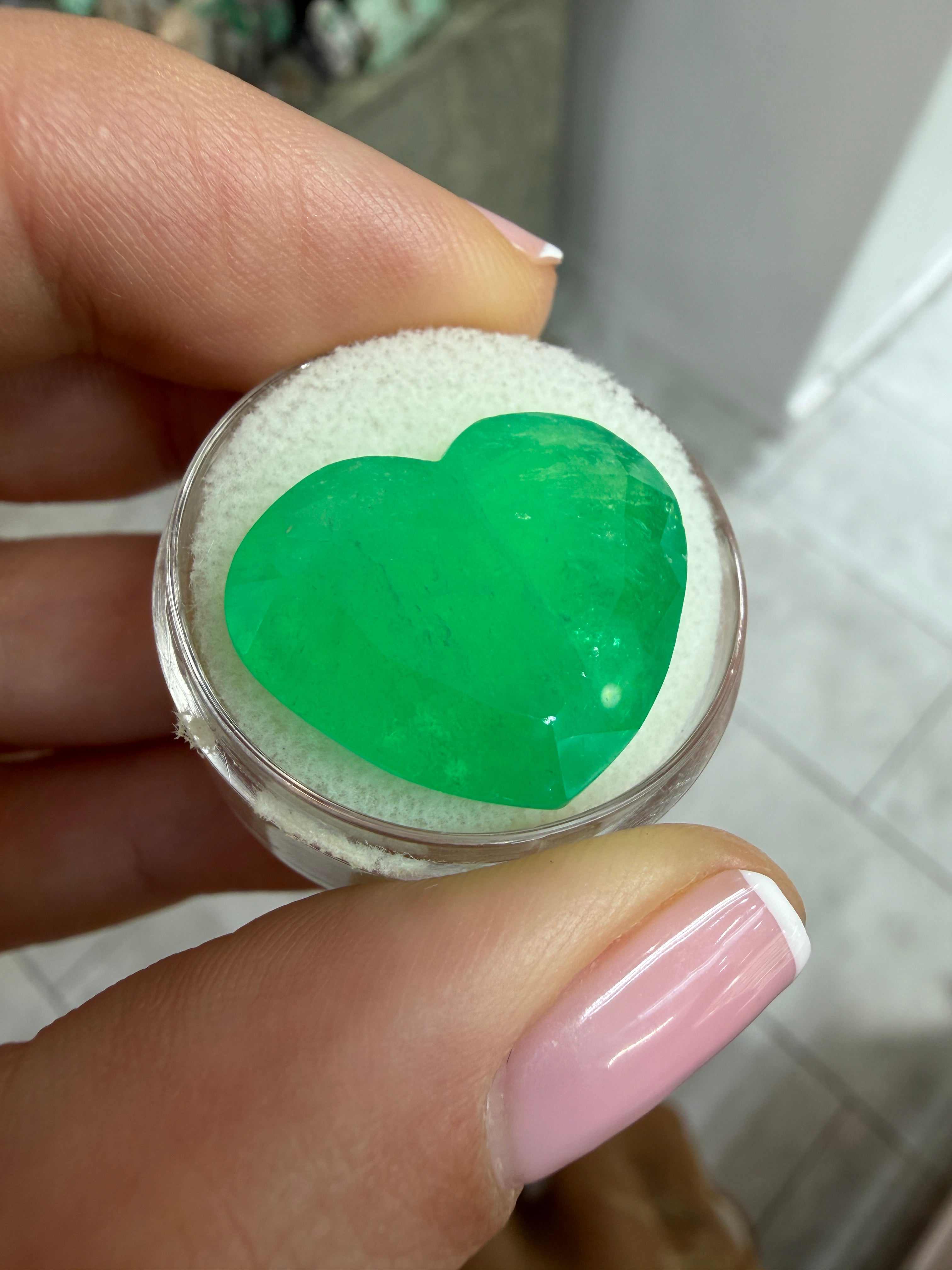 Large 23.97 carat bright green natural Colombian emerald heart cut, loose gemstone, from JR Colombian Emeralds.