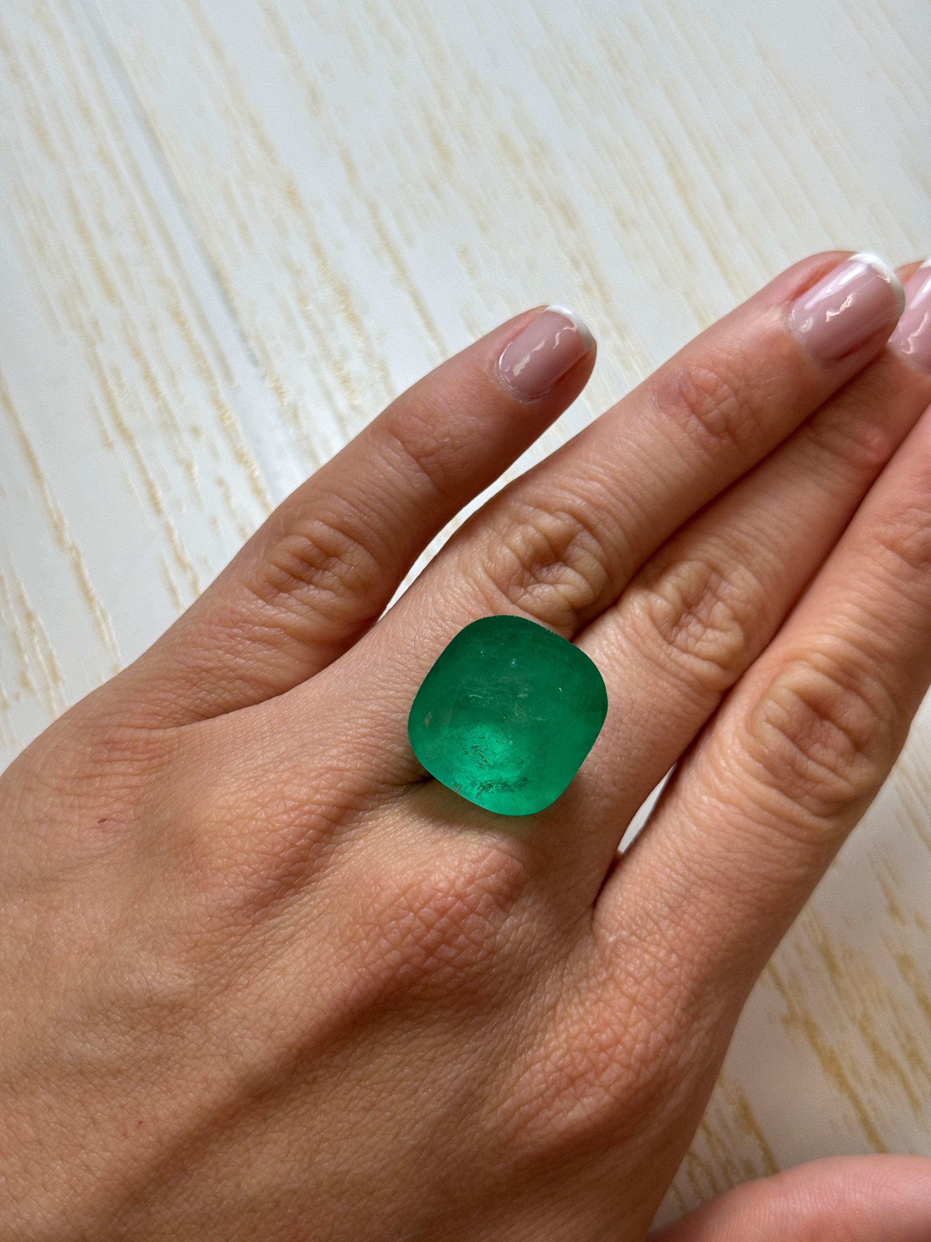Large 30.43 Carat spring green Colombian emerald in cushion cut, natural loose gemstone from JR Colombian Emeralds.