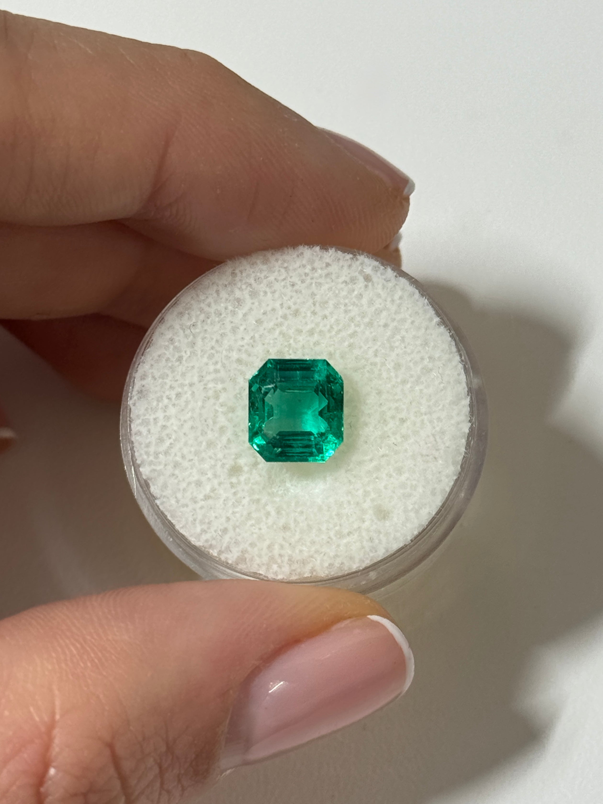 2.31-carat rare no-oil Colombian emerald Asscher cut gemstone from JR Colombian Emeralds, showcasing vibrant green color and clarity