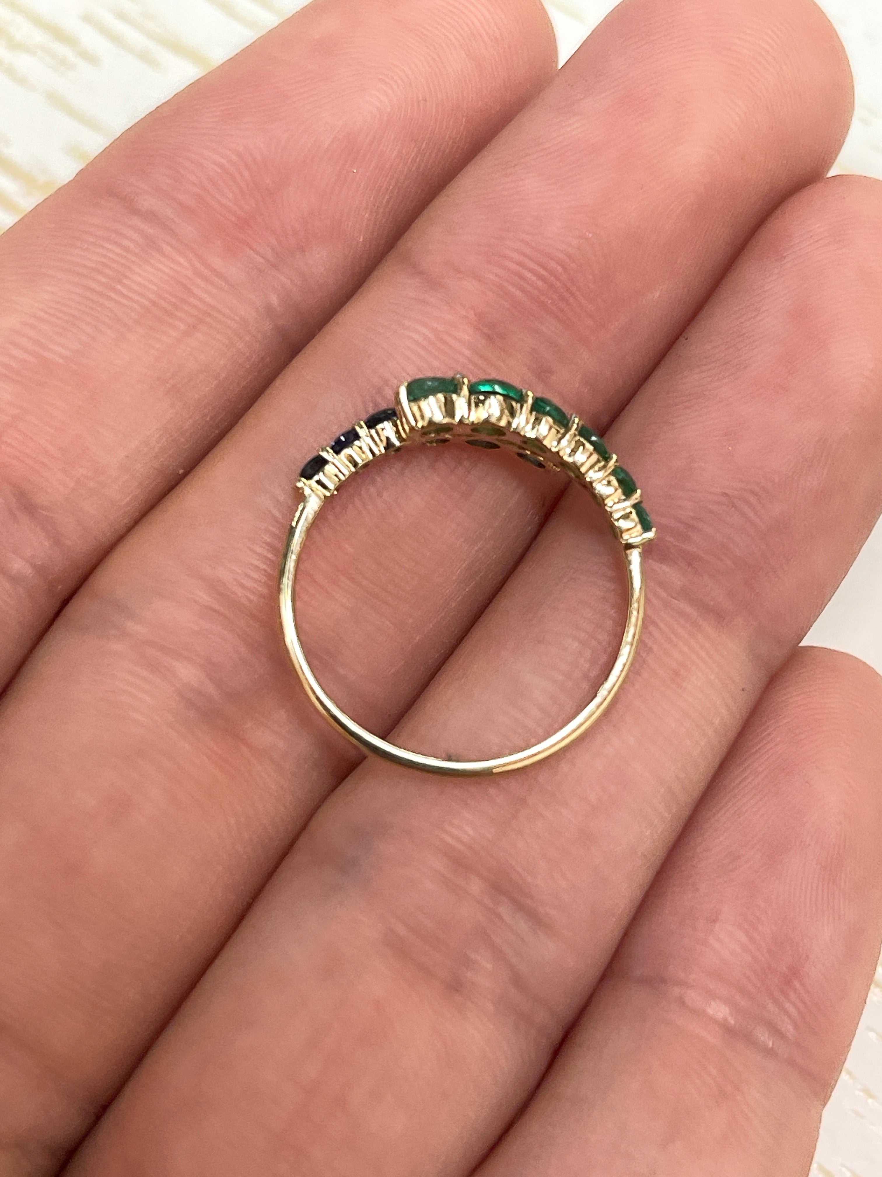 JR Colombian Emeralds Satinder ring featuring 0.95tcw emerald and ruby gemstones in a 14K setting, size 12.