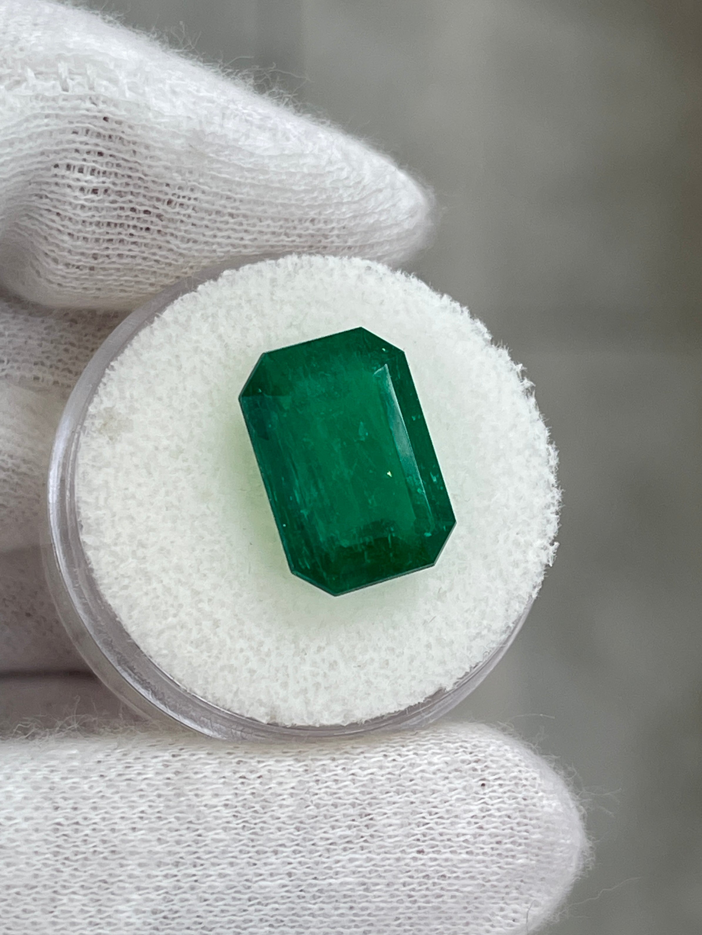 6.39 carat vivid green Colombian emerald cut loose gemstone, double certified AAA+ quality from JR Colombian Emeralds.