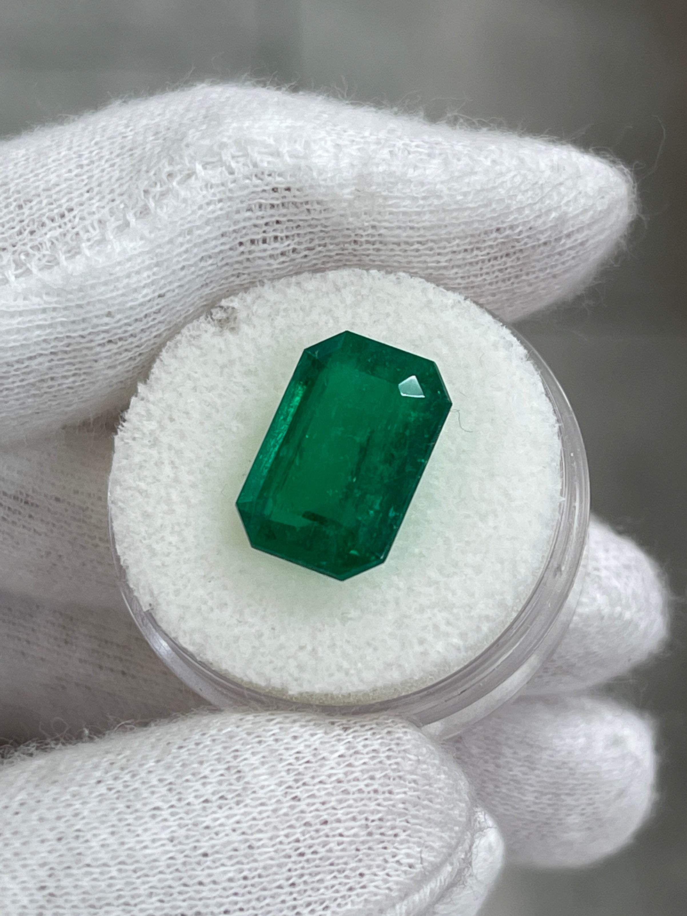 6.39 carat double-certified AAA+ Vivid Muzo green Colombian emerald cut loose gemstone from JR Colombian Emeralds