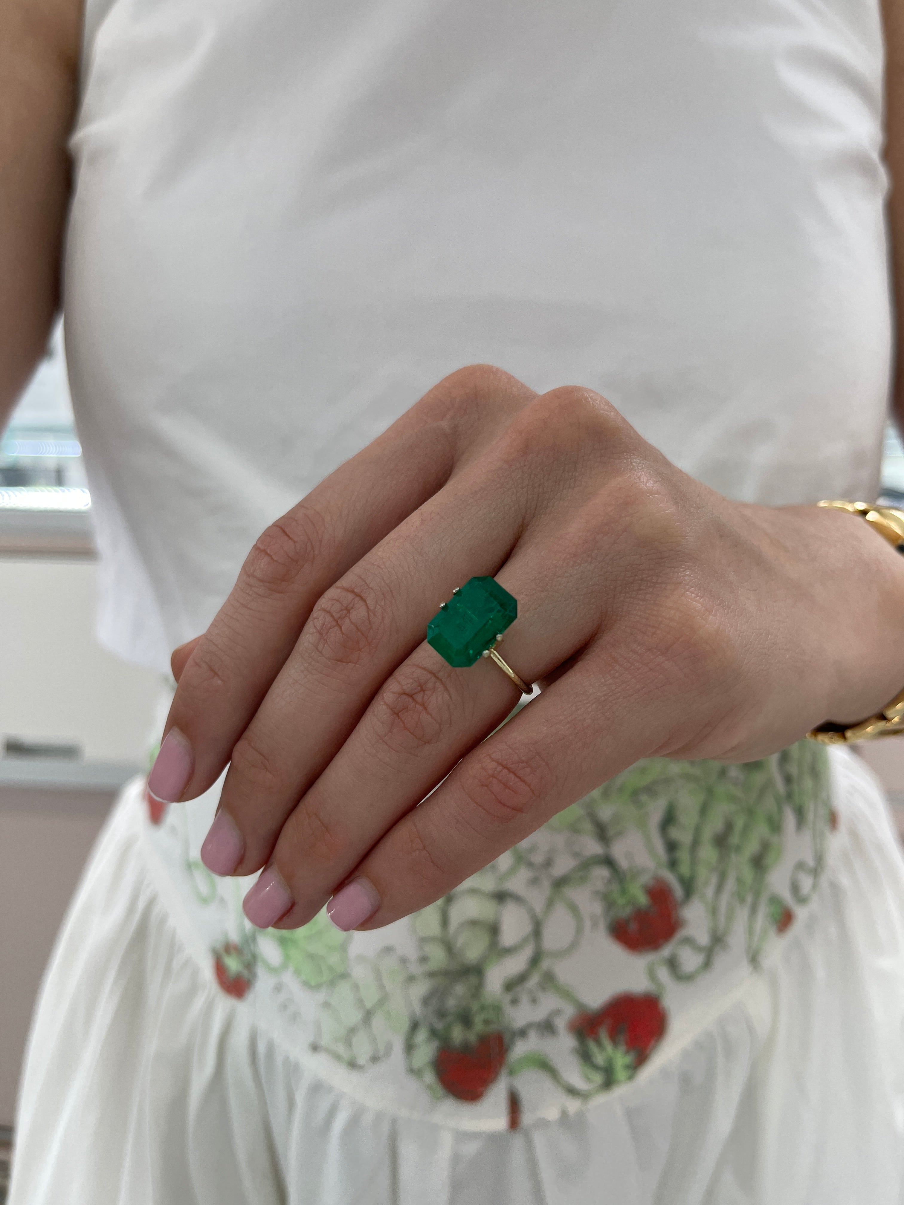 6.39 Carat Vivid Muzo Green Colombian Emerald Cut loose gemstone with double certification by JR Colombian Emeralds.