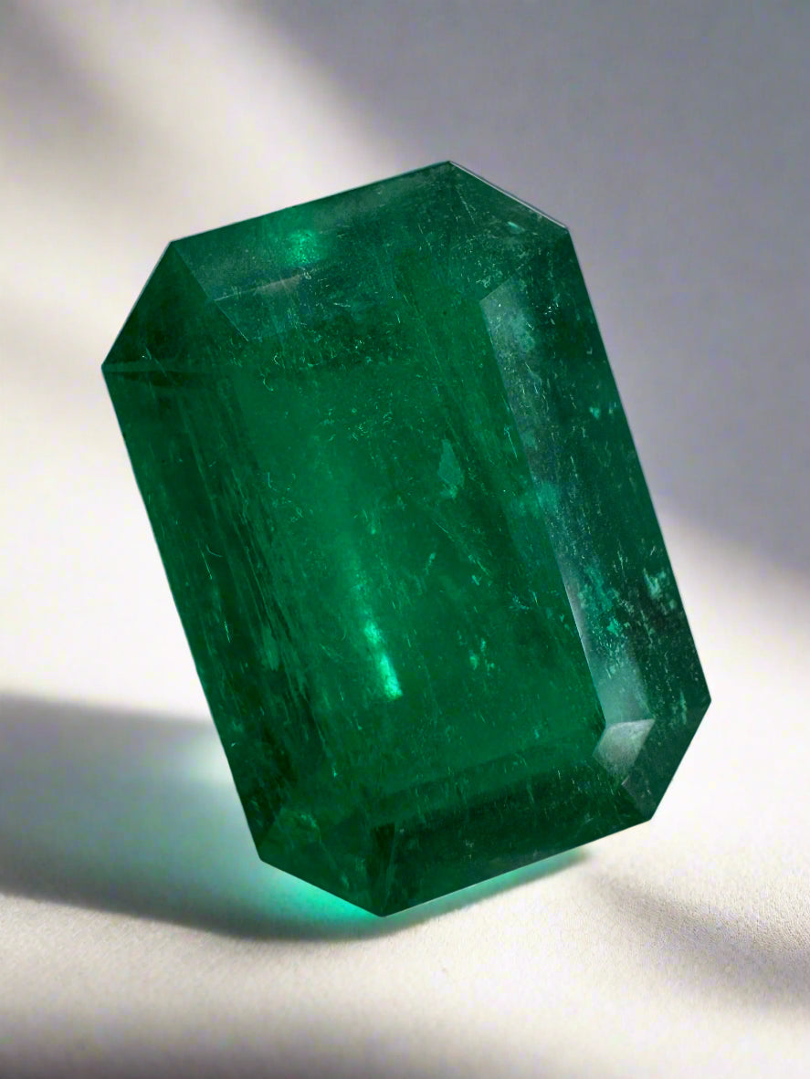 6.39 carat double-certified AAA+ Muzo green Colombian emerald cut loose gemstone with vivid green color and clarity