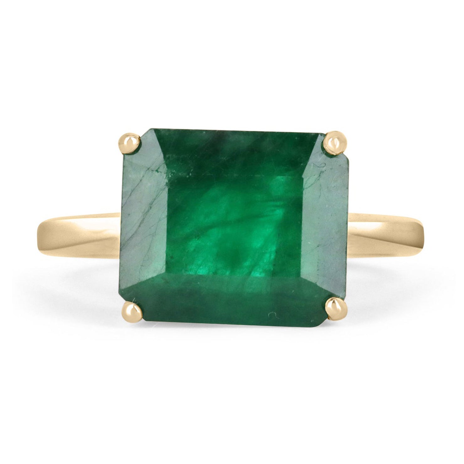 4.79 carat dark green natural emerald solitaire ring in 14K yellow gold.