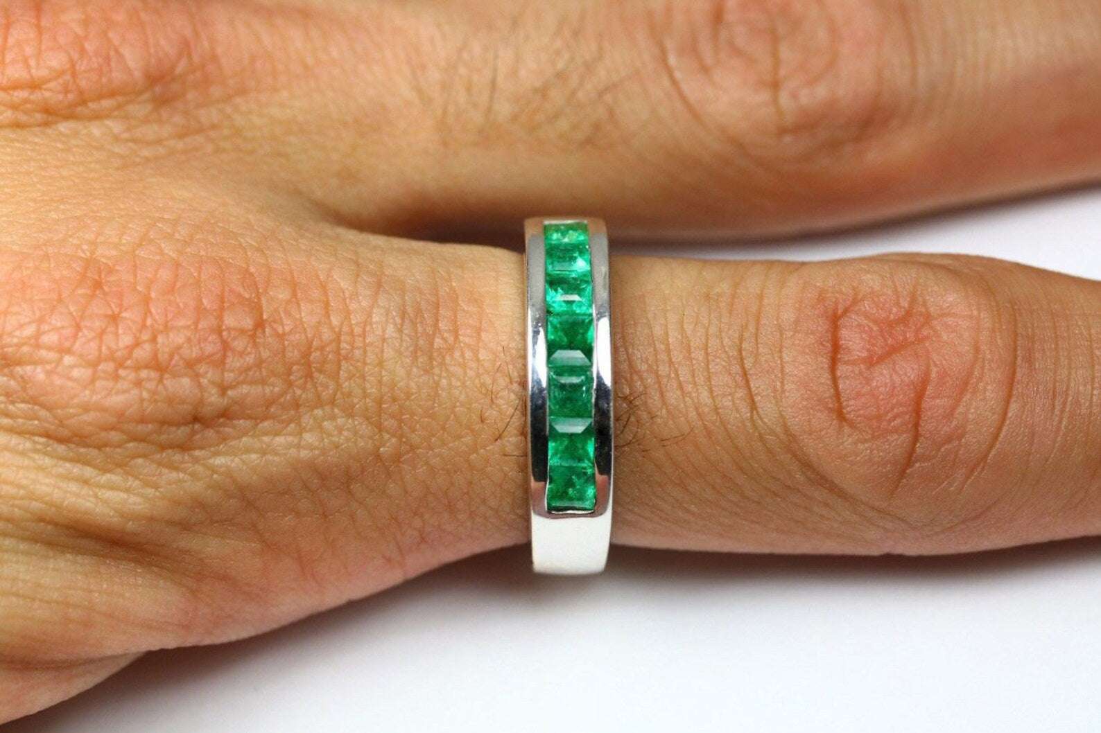 Men's 14K gold band ring featuring 1.40tcw vivid green emeralds by JR Colombian Emeralds.