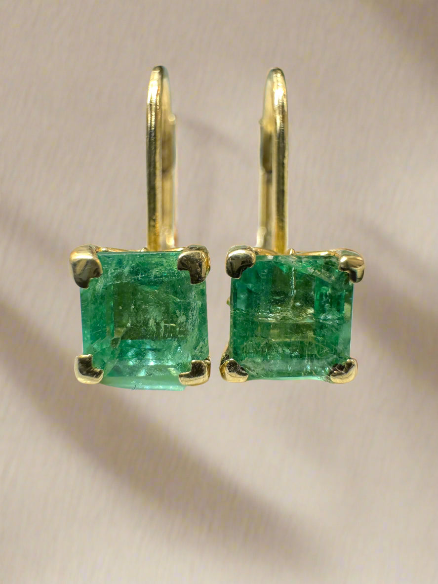 Square emerald leverback earrings with fleur de lis design, 14K gold and 1.44 tcw from JR Colombian Emeralds.