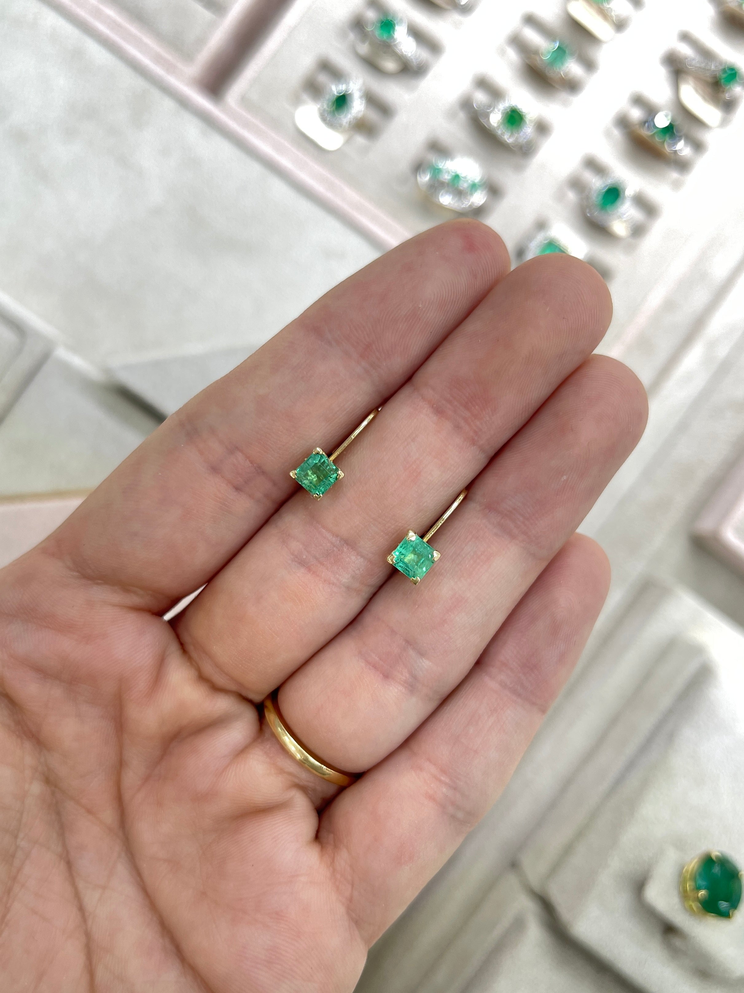 Square emerald leverback earrings with fleur de lis design in 14K gold, featuring 1.44tcw of sparkling emeralds by JR Colombian Emeralds