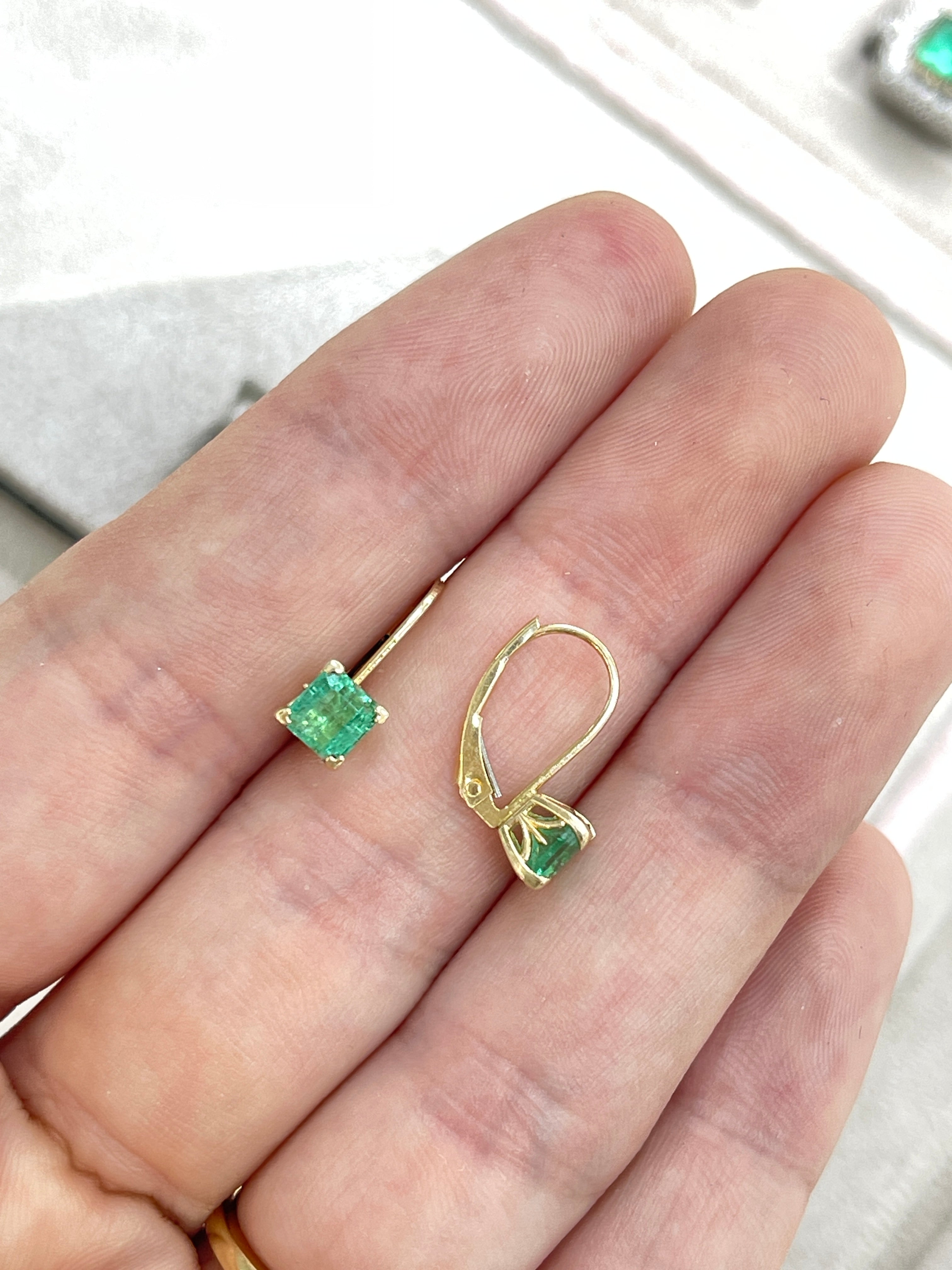 14K yellow gold square emerald leverback earrings with fleur de lis design, featuring 1.44 carats of sparkling emeralds by JR Colombian Emeralds.