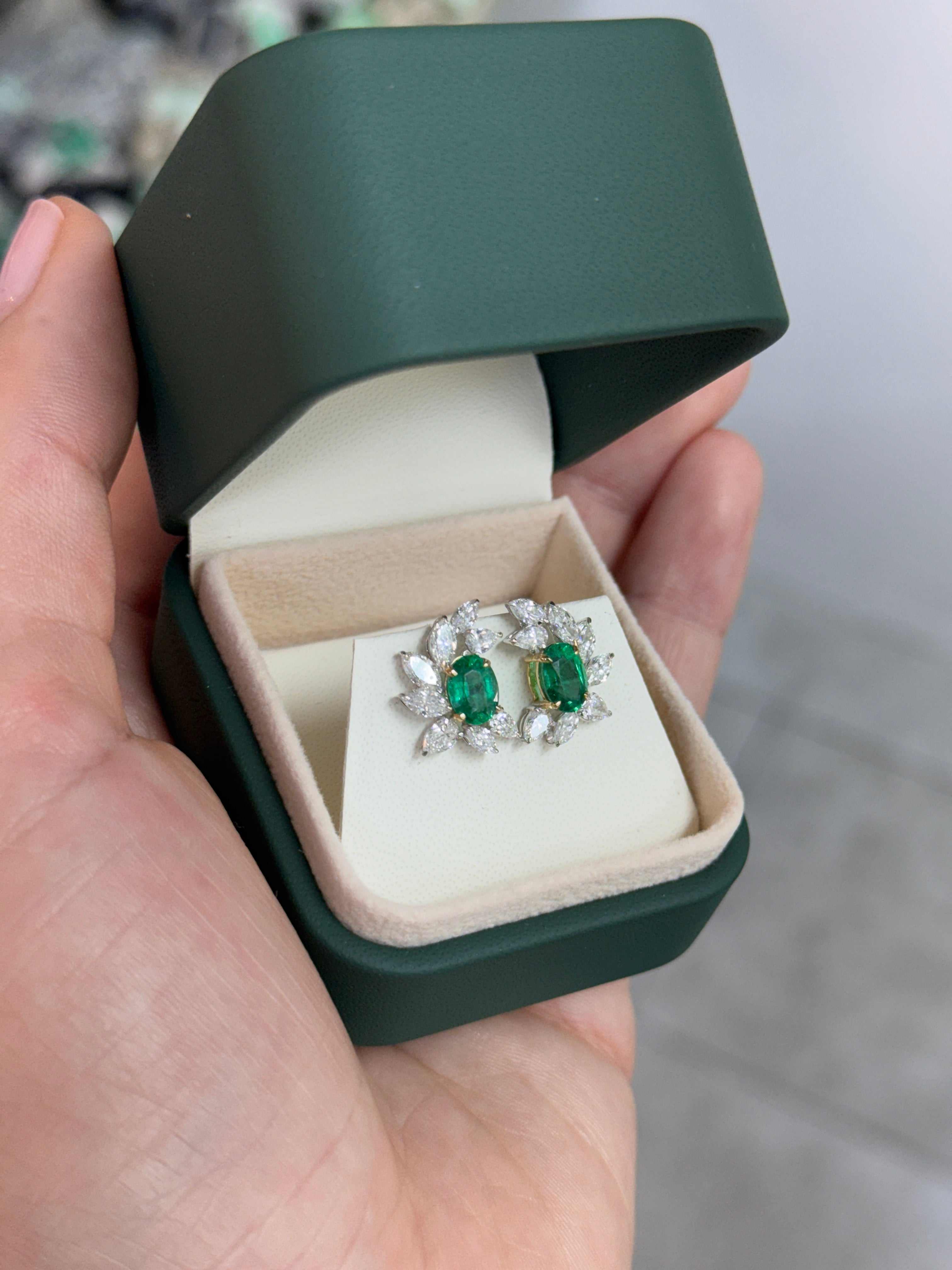 JR Colombian Emeralds 3.69tcw oval emerald and diamond marquise and pear statement stud earrings in 18K gold, detailed close-up image