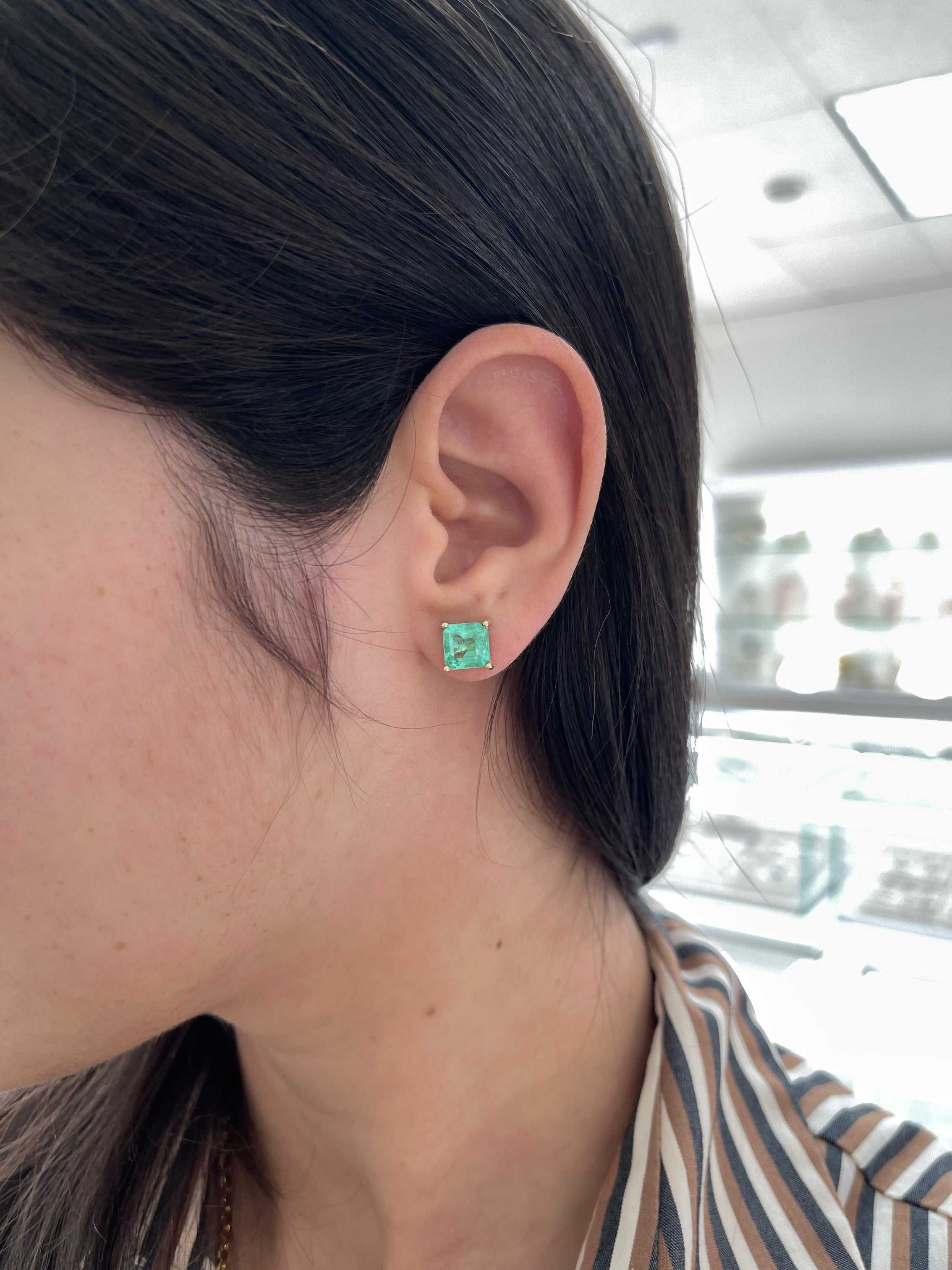 Asscher cut Colombian emerald stud earrings with earthy spring green color, 3.97tcw, set in 14K gold, by JR Colombian Emeralds.
