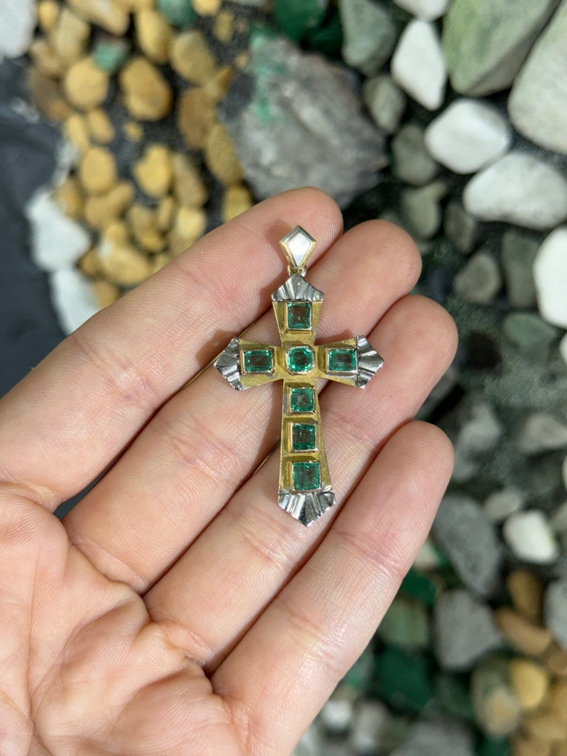 Unisex emerald cross pendant with 2.55tcw natural Colombian emeralds in two-tone 18K yellow and white gold.