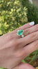 8.0ct pear-shaped Colombian emerald and diamond three-stone engagement ring in 18K gold bezel setting by JR Colombian Emeralds