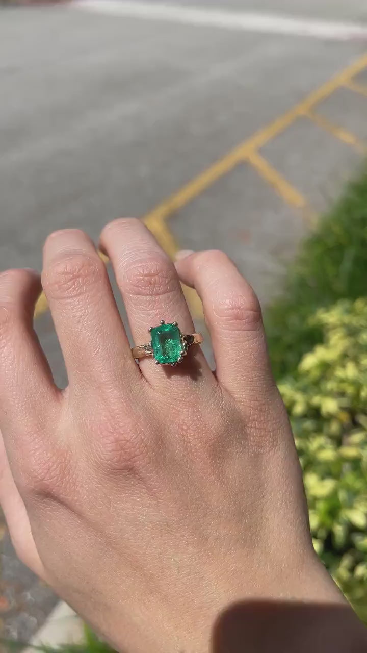 Elegant 3.93ct Oval Dark Green Emerald Ring in 14K Gold with Decorative Scroll Detail