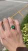 Elegant 3.93ct Oval Dark Green Emerald Ring in 14K Gold with Decorative Scroll Detail