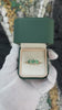 2.20 carat round emerald three-stone ring for women in 14K gold, featuring deep green gemstones