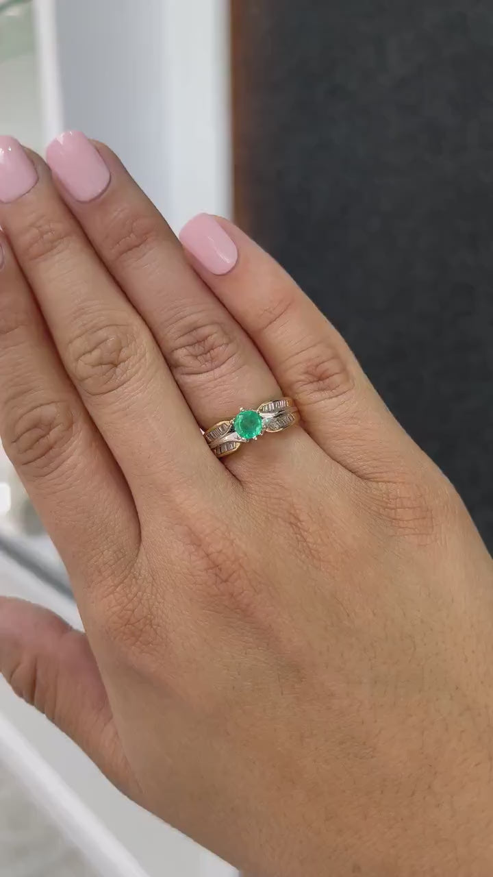 Dazzling Brilliance: 0.85tcw Two-Toned Gold Round Cut Emerald & Tapered Baguette Diamond Ring - Elegant Design