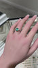 Elegant 14K Gold Ring Featuring Oval Emerald and Medium Dark Green Diamond Accents (1.30 Total Carat Weight)