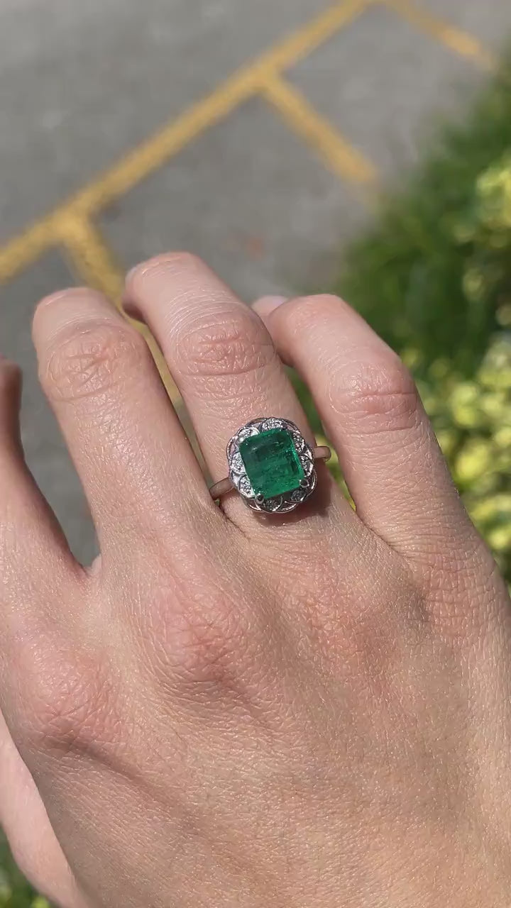 Stunning 3.60tcw Floral Engagement Ring in White Gold Featuring Green Emerald and Diamonds