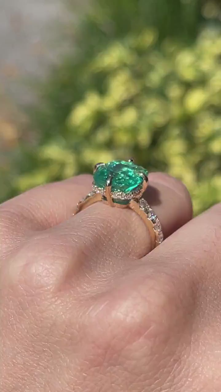 Elegant 6.54tcw Emerald Engagement Ring with Sparkling Diamond Highlights