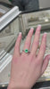 14K Gold Halo Engagement Ring with Cushion Cut Emerald and Diamond Accents