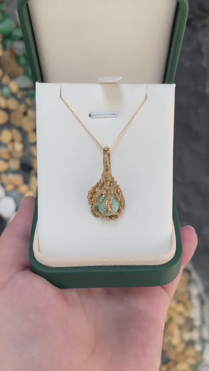 Stunning 6.80-Carat Free Floating Emerald Pendant in 14K Yellow Gold with Nugget Cage Design