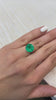 Natural Colombian Emerald: 6.16 Carat Round Gem, 12x12mm, Green and Freckled