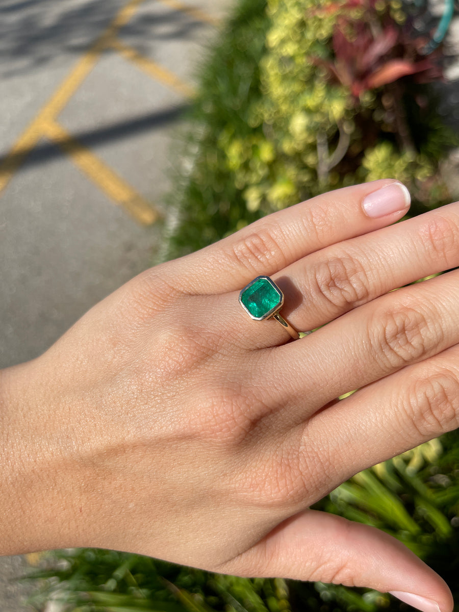 Bezel Set Emerald Solitaire Engagement Ring