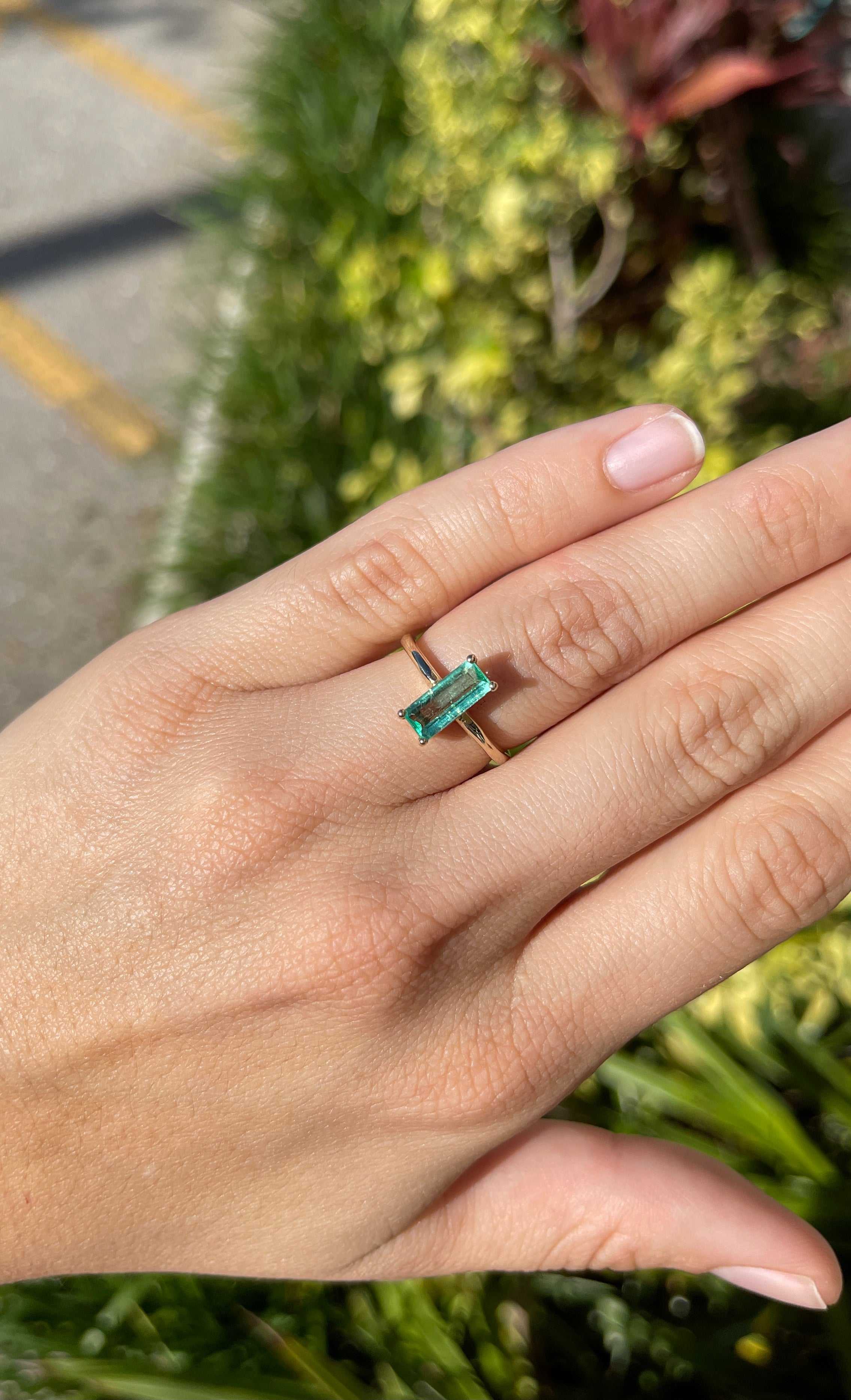 Elongated Emerald Cut Colombian Emerald 1.90cts Solitaire 14K Gold Four Prong Ring on hand