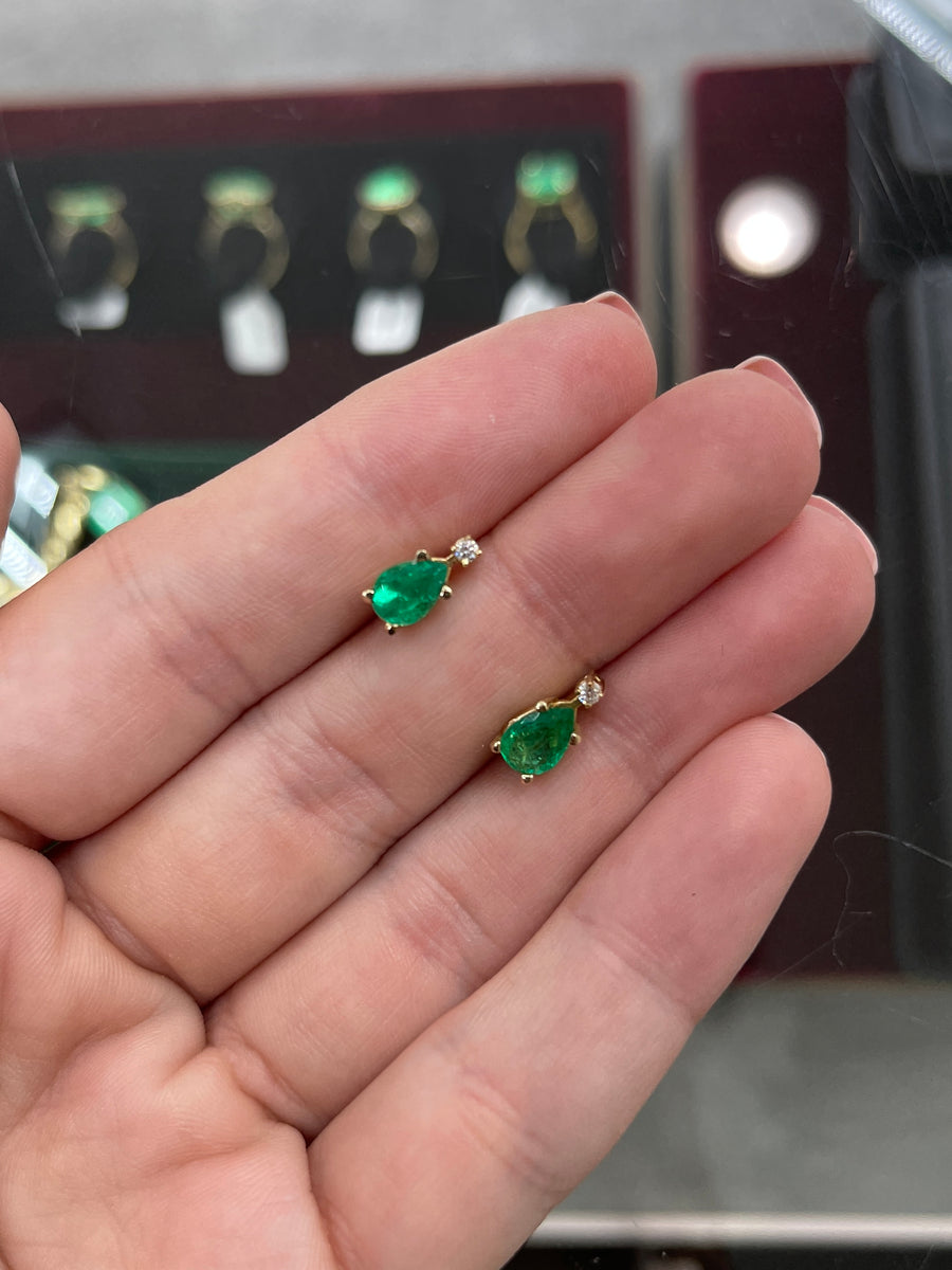 Vivid Green 1.41 Carat Pear Cut Colombian emerald and diamond two stone stud earrings 14K