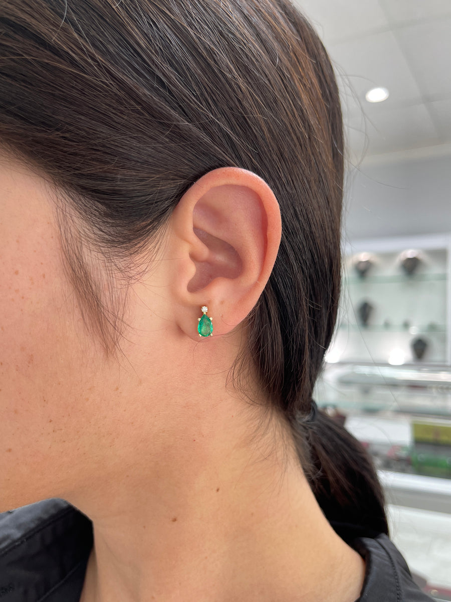 1.41tcw 14K Colombian Emerald-Pear Cut & Diamond Accent Stud Two Stone Earrings on ear