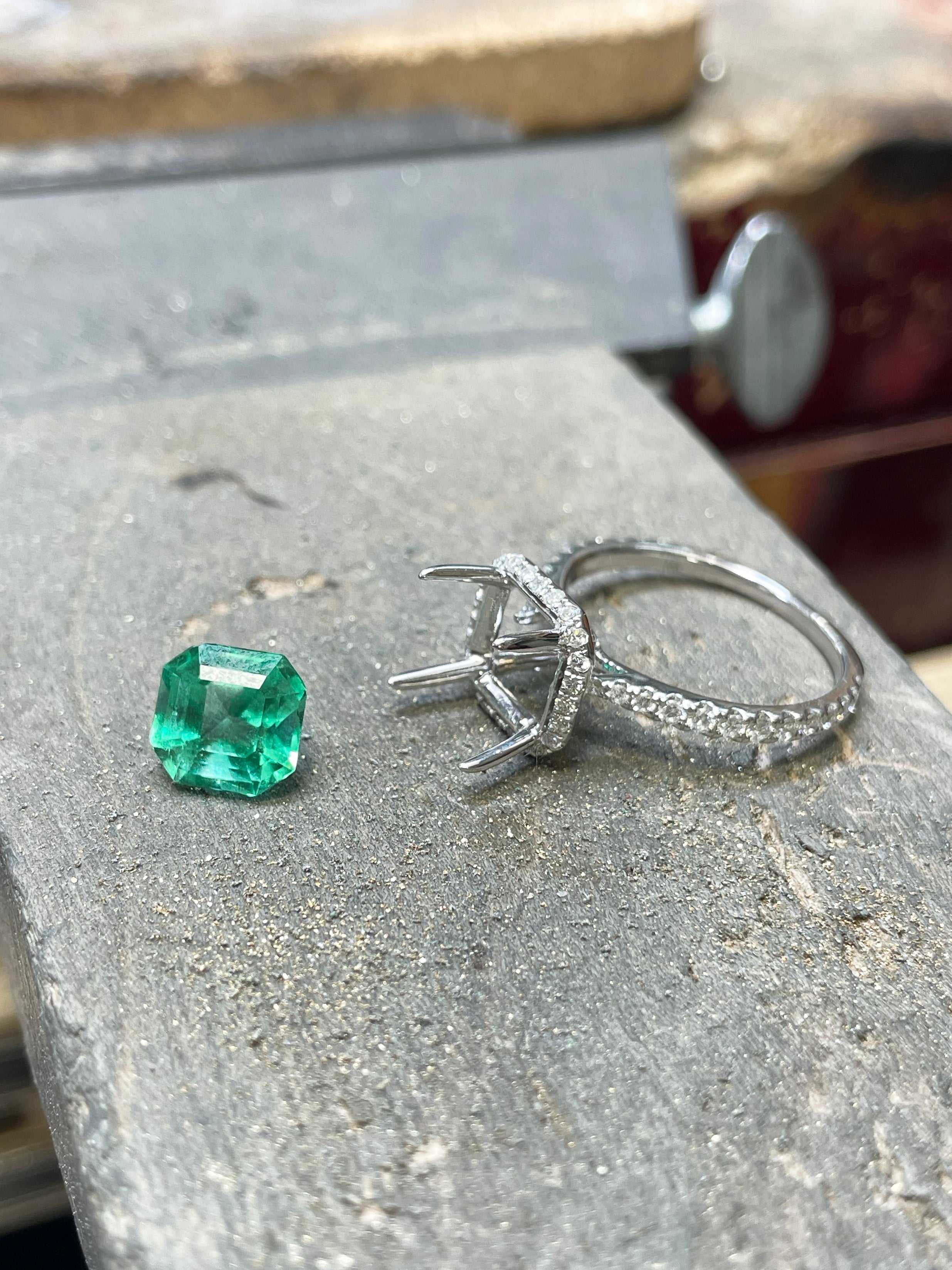 Luxurious Asscher Cut Emerald and Diamond Halo Ring in 18K White Gold