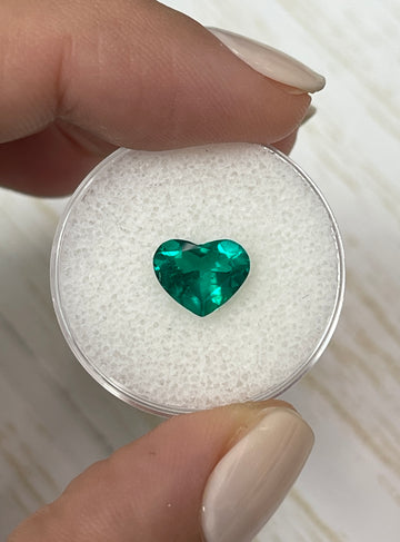 Stunning Heart-Cut Ring Featuring a 1.55 Carat Vivid Muzo Green Colombian Emerald