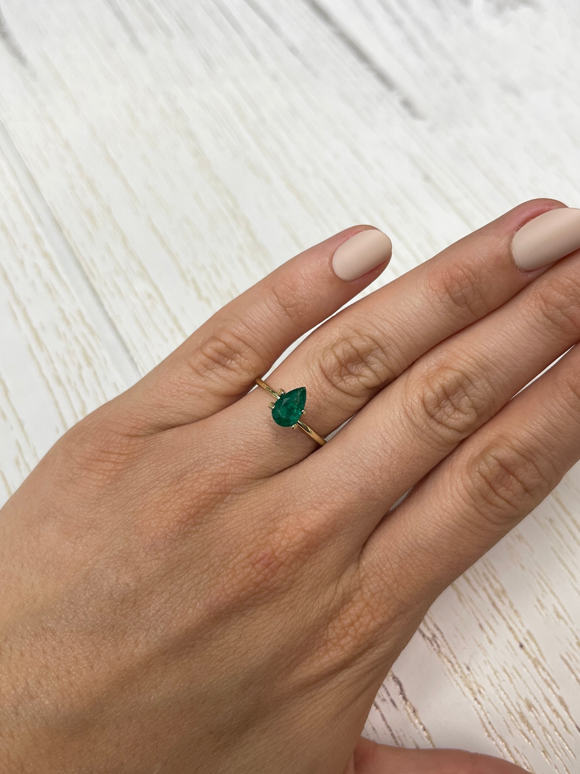 0.78 Carat Colombian Emerald with Pear Cut in Rich Muzo Green