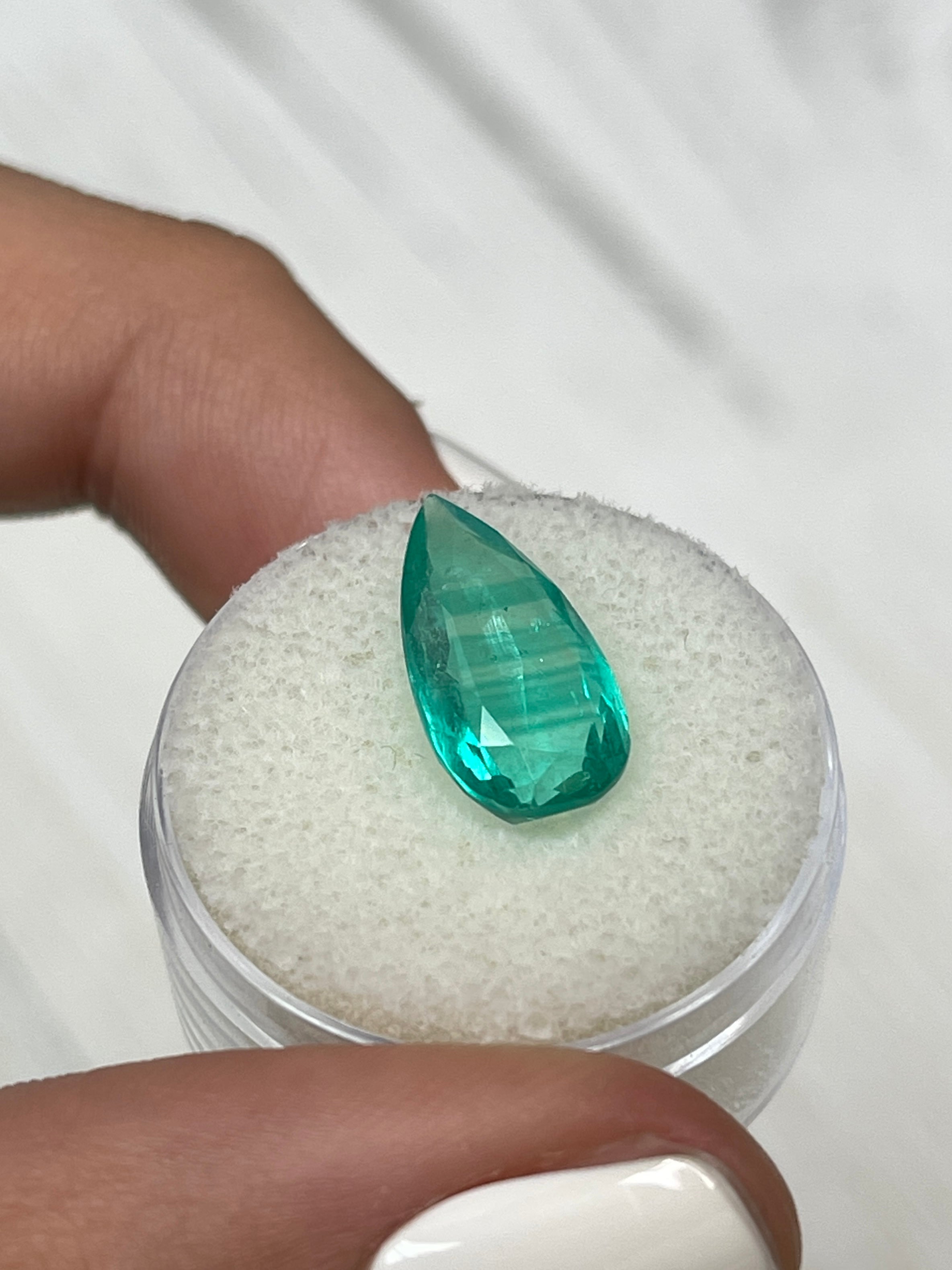 Rare 4.13 Carat Pear-Cut Colombian Emerald Exhibiting Natural Color Variations