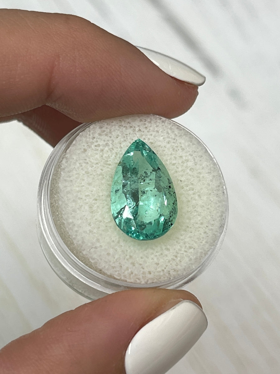 16x10mm Pear-Shaped Colombian Emerald - 6.41 Carat - Light Green with Natural Speckles