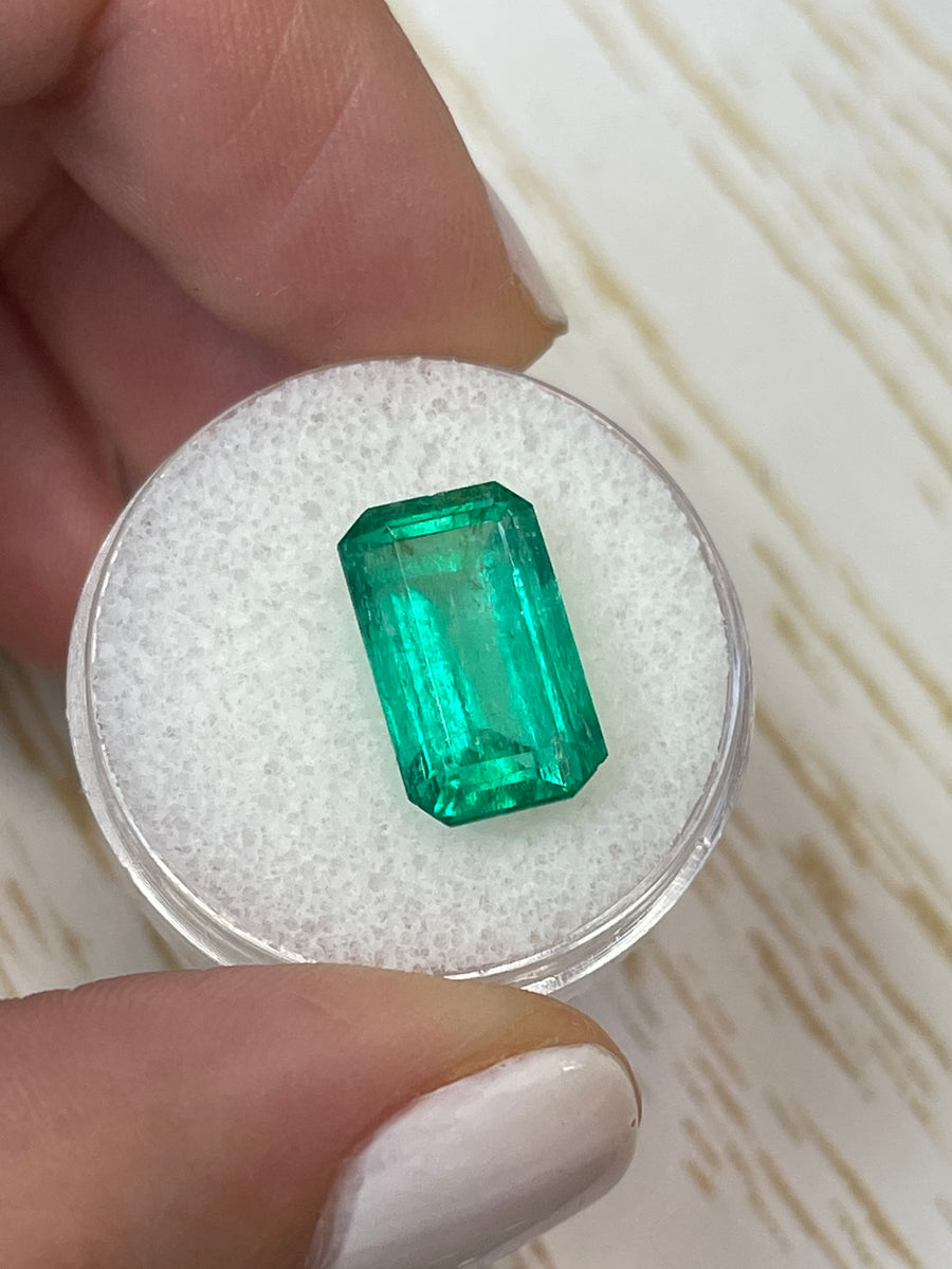 Vibrant Bluish Green 14x9 Carat Colombian Emerald in an Emerald Cut