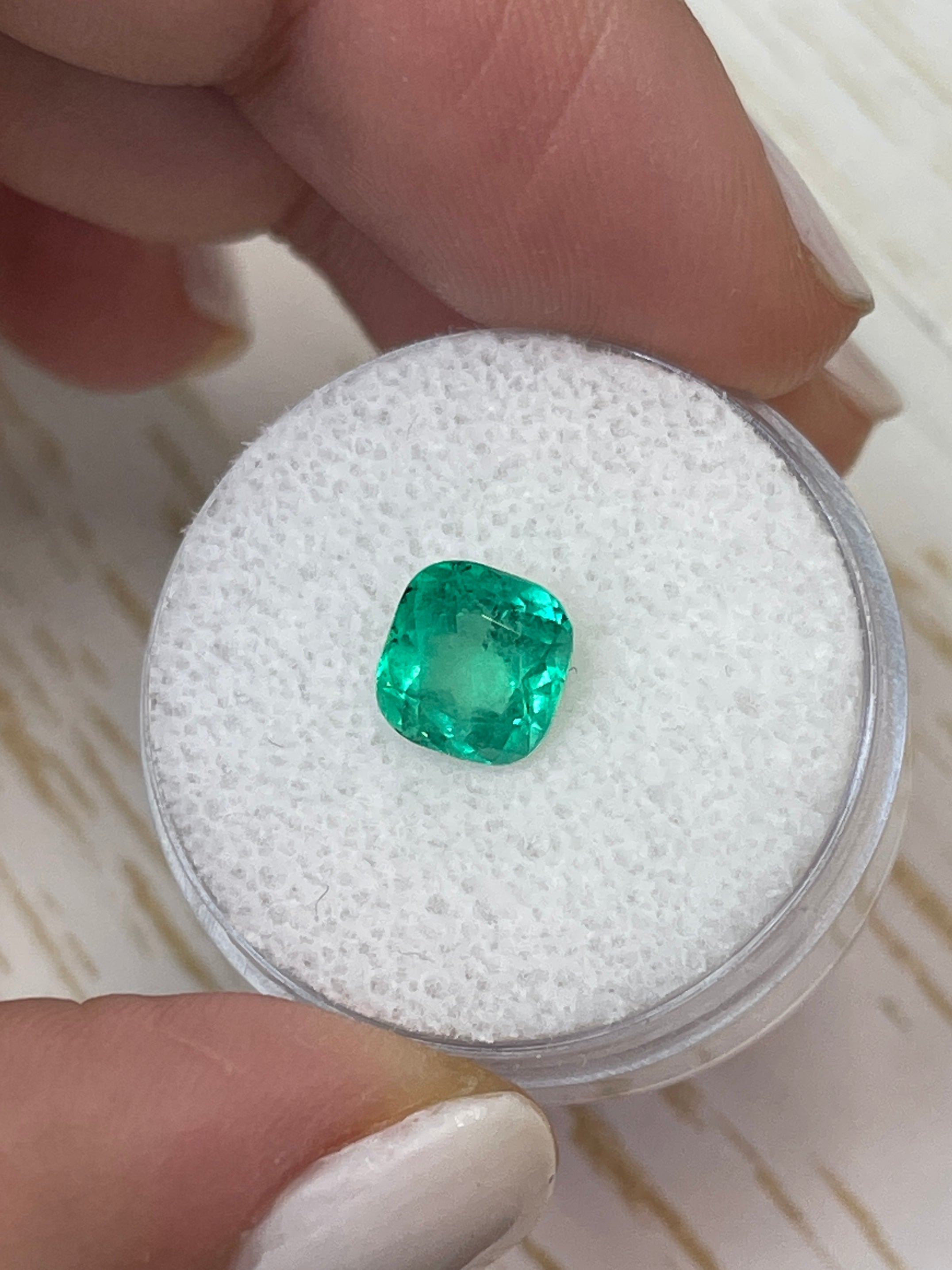 Medium Green Colombian Emerald - 1.56 Carat, Cushion Cut, Natural Freckles