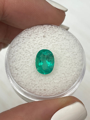 Oval Cut Colombian Emerald - 1.74 Carat Loose Gemstone with Unique Bluish Green Freckles