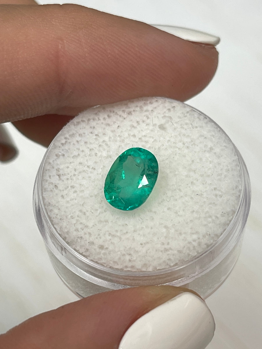 1.74 Carat Oval Shaped Colombian Emerald - Authentic, Bluish Green with Freckles