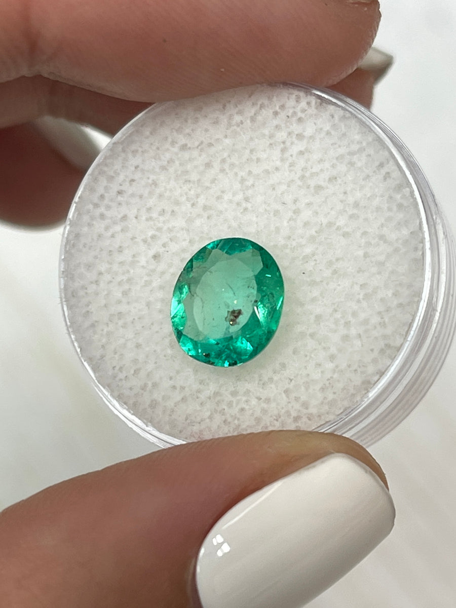Rare Freckled Green Colombian Emerald - 1.80 Carat Oval Loose Stone