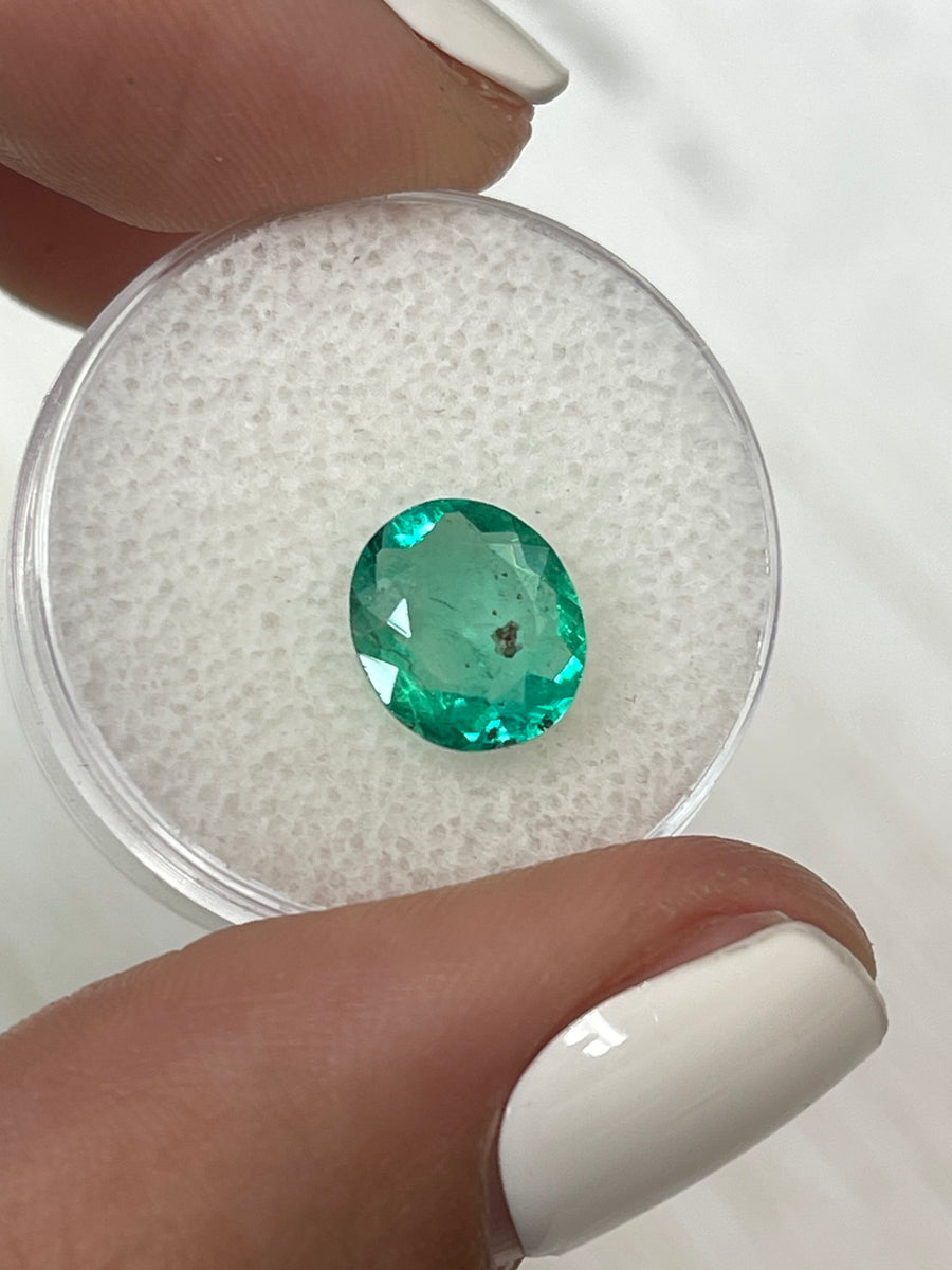 Colombian Emerald: Oval Cut, 1.80 Carat, Distinctive Green Freckles - Loose Gem