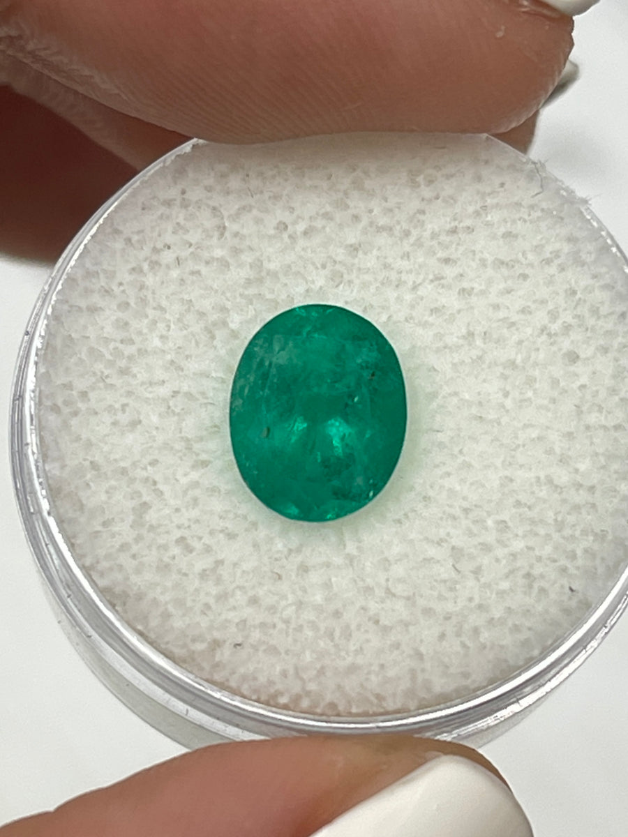 Oval-Cut Colombian Emerald: 2.03 Carats of Natural Dark Green Beauty